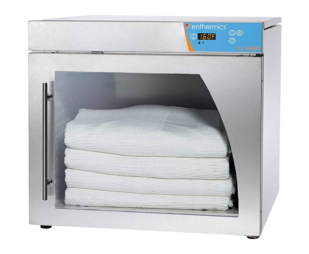 Enthermics warmer with folded white cloths inside on a white background